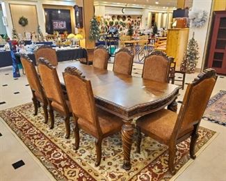 Formal dining set with 10 chairs! Get ready for the holidays with this beautiful set!