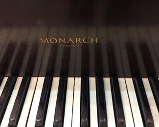Vintage Monarch 5' baby grand piano.