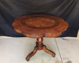 Walnut Italian inlaid top table with a hand-carved pedestal.