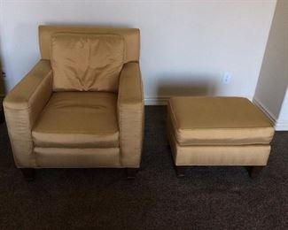 Upholstery chair and ottoman in gold colored silk.