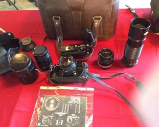 Vintage Canon A1 Camera  2 extra Lens/ Light Flash Kit & Leather Camera Bag and paperwork 