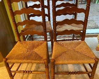Set of four vintage ladder-back chairs