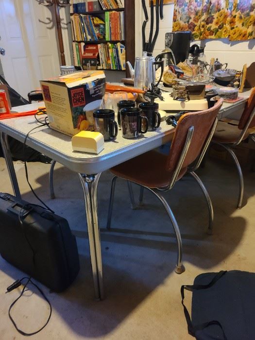 50's chrome table with 4 chairs
