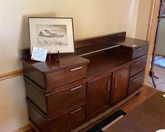 Beautiful buffet and table  with pic of Enola Gay