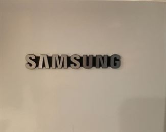 Samsung LG French door refrigerator with icemaker; measurements are 60" High, 32" deep, 36" wide