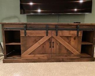 BARN DOOR MEDIA CABINET(BEST BUY) 2 YRS OLD OUR PRICE IS MUCH LESS