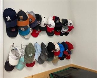 Tons of ball caps and athletic hats! Vintage sports team hat collection available! 