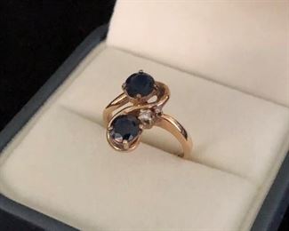 Blue sapphires, one diamond, 14k ring