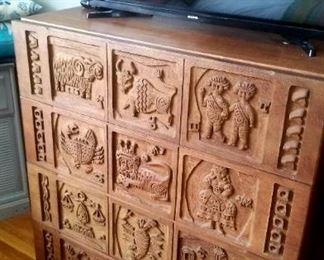 Rare Carved front dresser, Zodiac design, by noted American designer Evelyn Ackerman