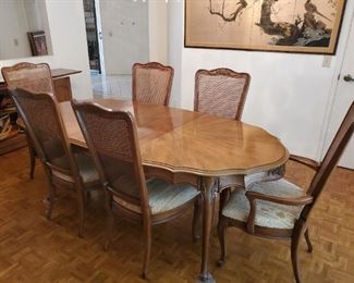 Dining Set by "White" has 6 chairs and two leaves and includes the custom made protective pads