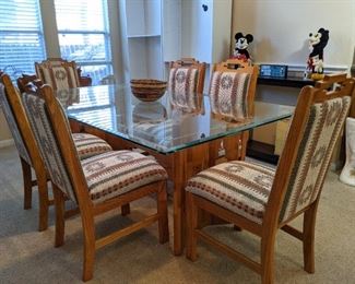 Aztec glass-top dining table with 6 upholstered chairs (72 x 42")