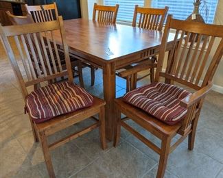 Dining table with 4 side chairs and 2 armchairs (39 1/4 x  70 3/4")