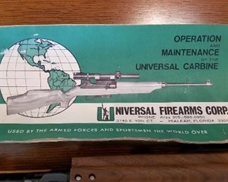 M1 Carbine 30 cal. rifle made by Universal Firearms in good condition with magazine, scope mount, and original paperwork