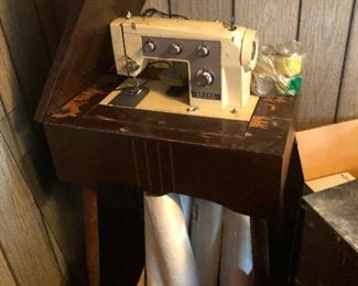 sewing machine pounding its head against the wall