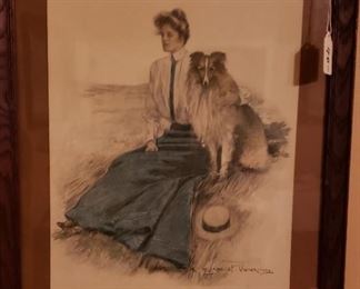 framed print of lady/dog