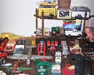 Toy cars, airplanes and guns