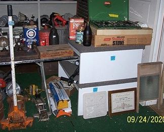 Coleman stove w/ box, hydraulic jacks, washboards, etc..