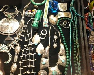 ** Security video surveillance systems are set up at each sale for our clients security and yours. Fine jewelry is removed from property until day of sale.**         All the pretty things are up front with Lila and Linda.. an assortment of&nbsp;Sterling Frames to Costume Jewelry.. .925 Jewelry to 14k, 18k and 22k, Trio 18k Brooch, Concord 18k watch, Judith Leiber Combs, Tory Burch, Dolce and Gabbana, Henri Bendel, Velatti, Elaine Coyne, Estée Lauder decorative compacts, Matt Mitchell, Leslie Block and Elizabeth Showers, James Reid 925 belt, Lagos Caviar, David Yurman, Bent Knudsen, Native American Navajo storyteller KK bracelet, 970 sterling Tuka cuff bangle,&nbsp; Nikken, Elliot Chandler, Dulce, Lalique butterfly pendant, M & J Savitt, Women's Movado watch, Los Ballesteros Cuff bracelet, Zuni, Lupe Romero Taos ring, T. Foree, Vintage Squash blossom, Navajo Helen Chee necklace, W. Dodson Belt buckle, Omar Thompson, Emma Lincoln, Chili Rose, Glass Blue Bird of Happiness Lee Ward 1990, Cinnabar ba