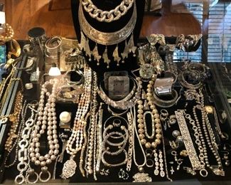 ** Security video surveillance systems are set up at each sale for our clients security and yours. Fine jewelry is removed from property until day of sale.**         All the pretty things are up front with Lila and Linda.. an assortment of&nbsp;Sterling Frames to Costume Jewelry.. .925 Jewelry to 14k, 18k and 22k, Trio 18k Brooch, Concord 18k watch, Judith Leiber Combs, Tory Burch, Dolce and Gabbana, Henri Bendel, Velatti, Elaine Coyne, Estée Lauder decorative compacts, Matt Mitchell, Leslie Block and Elizabeth Showers, James Reid 925 belt, Lagos Caviar, David Yurman, Bent Knudsen, Native American Navajo storyteller KK bracelet, 970 sterling Tuka cuff bangle,&nbsp; Nikken, Elliot Chandler, Dulce, Lalique butterfly pendant, M & J Savitt, Women's Movado watch, Los Ballesteros Cuff bracelet, Zuni, Lupe Romero Taos ring, T. Foree, Vintage Squash blossom, Navajo Helen Chee necklace, W. Dodson Belt buckle, Omar Thompson, Emma Lincoln, Chili Rose, Glass Blue Bird of Happiness Lee Ward 1990, Cinnabar ba