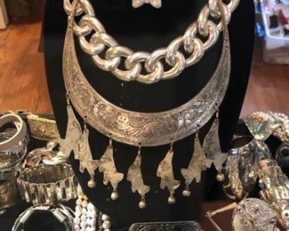 ** Security video surveillance systems are set up at each sale for our clients security and yours. Fine jewelry is removed from property until day of sale.**         All the pretty things are up front with Lila and Linda.. an assortment of&nbsp;Sterling Frames to Costume Jewelry.. .925 Jewelry to 14k, 18k and 22k, Trio 18k Brooch, Concord 18k watch, Judith Leiber Combs, Tory Burch, Dolce and Gabbana, Henri Bendel, Velatti, Elaine Coyne, Estée Lauder decorative compacts, Matt Mitchell, Leslie Block and Elizabeth Showers, James Reid 925 belt, Lagos Caviar, David Yurman, Bent Knudsen, Native American Navajo storyteller KK bracelet, 970 sterling Tuka cuff bangle,&nbsp; Nikken, Elliot Chandler, Dulce, Lalique butterfly pendant, M & J Savitt, Women's Movado watch, Los Ballesteros Cuff bracelet, Zuni, Lupe Romero Taos ring, T. Foree, Vintage Squash blossom, Navajo Helen Chee necklace, W. Dodson Belt buckle, Omar Thompson, Emma Lincoln, Chili Rose, Glass Blue Bird of Happiness Lee Ward 1990, Cinnabar ba