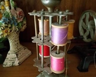 Vintage spool holder with pin cushion.