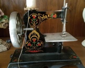 Vintage toy sewing machine.
