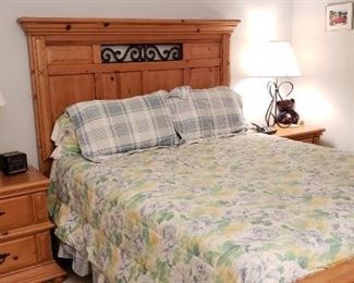 Queen size bed with mattress headboard and footboard.  Matching side tables and long bureau.   