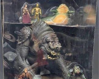 https://connect.invaluable.com/randr/auction-lot/star-wars-the-black-series-jabbas-rancor-pit_F2D4343B79