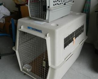 Large dog crate.  31" tall x  24 " wide x  36" long.  $50.