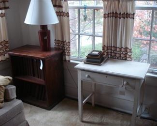 walnut bookcase, small kitchen table, frames