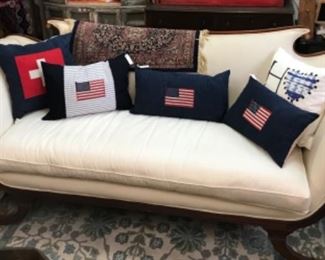 Duncan Phyfe sofa and vintage flag pillows. 
