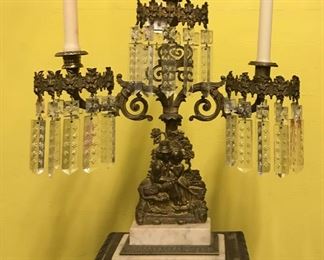 Brass candlestick with marble base and crystal prisms. 