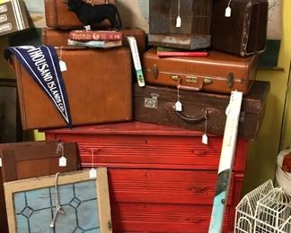 Vintage luggage - great condition. Painted red chest. Leaded glass window. Vintage wall map. 