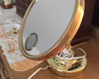 Lighted makeup mirror.