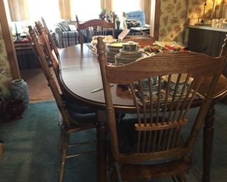 Dining room table and six chairs.