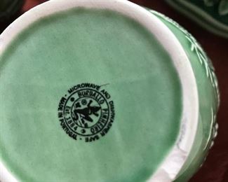 Bordallo pinheiro green plates, mug and bowls.