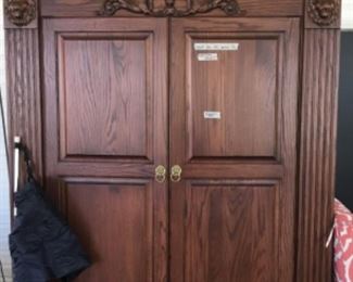 Carport items - large entertainment/armoire 