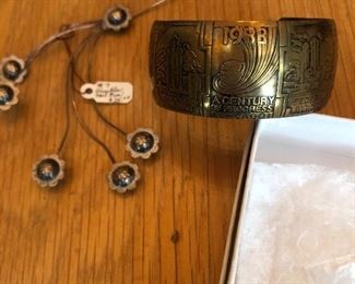 Antique hat pin and 1933 works fair cuff bracelet
