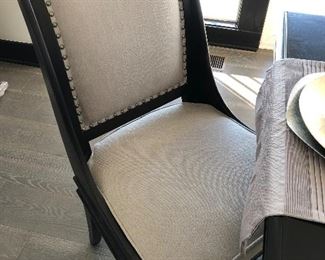 #2) - $750  Solid Wood Black Dining Table with 6 Chairs.  4 Matching Upholstered Chairs with Nailhead Trim and 2 Complimentary Chairs  72w x 42d x 30h.  This item may not be picked up until Wednesday, Oct 14 between 3:00 and 7:00 p.m.