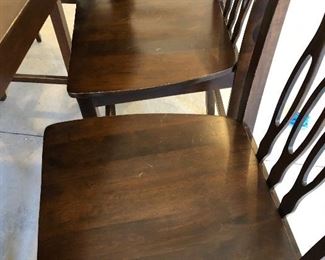 #24)  $200 - Solid Wood Counter Height Dining Table with 7 Barstool height Chairs.  36 x 54 x 36h.  Stools are 24 inches to the seat.  There are some scratches and marks on the seats and the table.