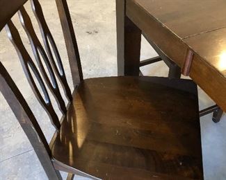 #24)  $200 - Solid Wood Counter Height Dining Table with 7 Barstool height Chairs.  36 x 54 x 36h.  Stools are 24 inches to the seat.  There are some scratches and marks on the seats and the table.