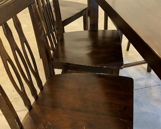 #24)  $200 - Solid Wood Counter Height Dining Table with 7 Barstool height Chairs.  36 x 54 x 36h.  Stools are 24 inches to the seat.  There are some scratches and marks on the seats and the table.