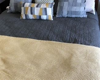 #121)  $140 - Queen Bedding.  Includes Queen Sheet set, Gray Quilt, Yellow Blanket, 4 Bed Pillows, 3 Shams with Pillows, 4 Decorator Pillows.  