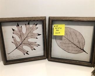 #124)  $30 - Set of 2 Framed Art.  12 x 12.