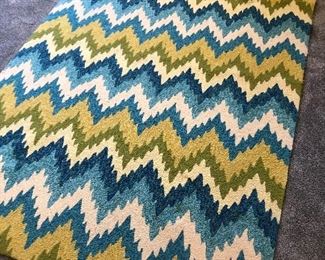 #138) $150 - Woven Rug.  90 x 60.