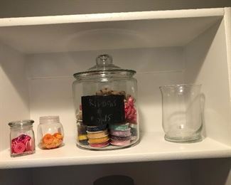 #139) $20 - Assortment of Glass Containers with various contents.