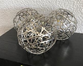 #148) $15 -Set of Three Silver Spheres.