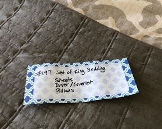 #197) $160 - Set of King Bedding.  Set Includes King Sheets, Duvet with Down Comforter, Gray Coverlet, 5 Accent Pillow (3 Gray and 2 White), 4 Square Sham Pillows, and 2 Regular Sham Pillows, 2 Bed Pillows.