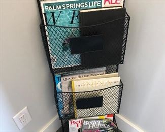 #214) $20 - Metal Wall Magazine Rack. 