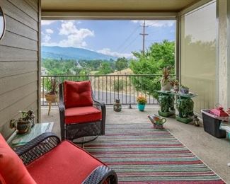 Deck off of Living Room with Wonderful views.  Special Installation of Rolling Shades for Privacy. 
